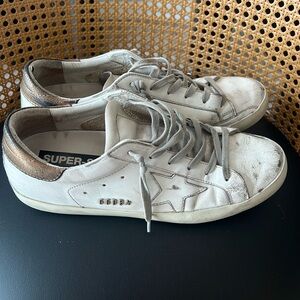 Golden goose 100%authentic Run small. I’m usually a 10 or size 40.